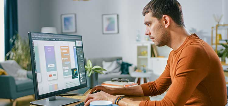 ux designer works on desktop mobile design usability and flow